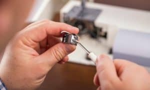 singer sewing machine repair boobin adjust
